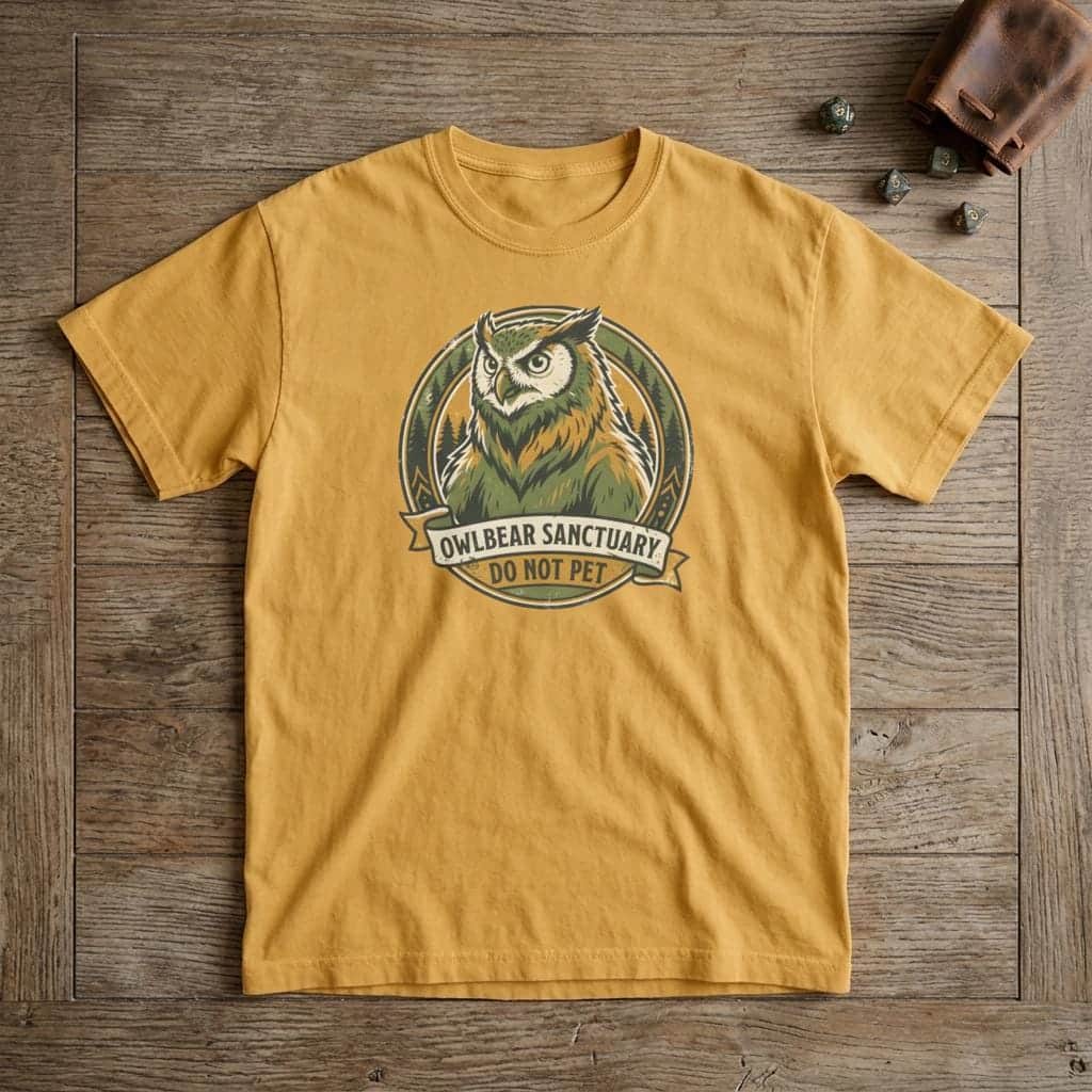 Photo 5 of 15: Vintage national park souvenir graphic tee featuring tabletop gaming's favorite deadly predator alongside a cheeky 'Do Not Pet' warning for players who insist on taming wilderness monsters, shown laid flat among dice