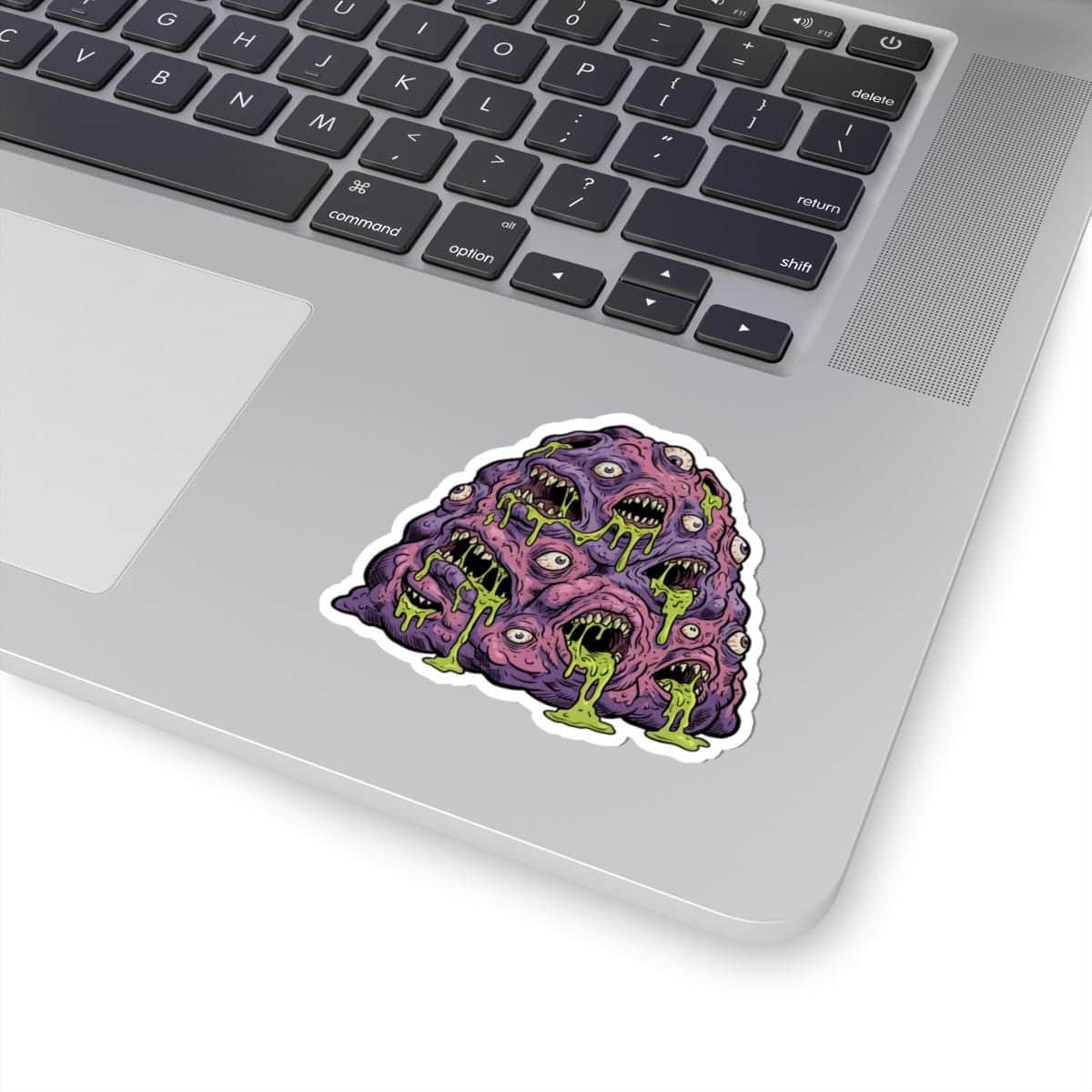 Photo 6 of 12: A grotesque aberrant monster sticker engineered for Dungeon Masters and eldritch horror enthusiasts personalizing laptops and hydro flasks, in a room setting