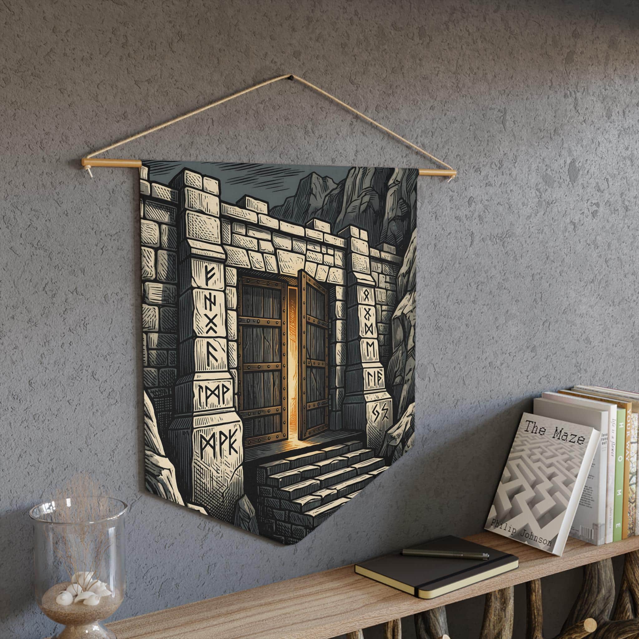 Photo 4 of 5: A tapered heraldic wall banner featuring a monumental dwarven mountain fortress gate etched in gold and slate linocut, in a room setting