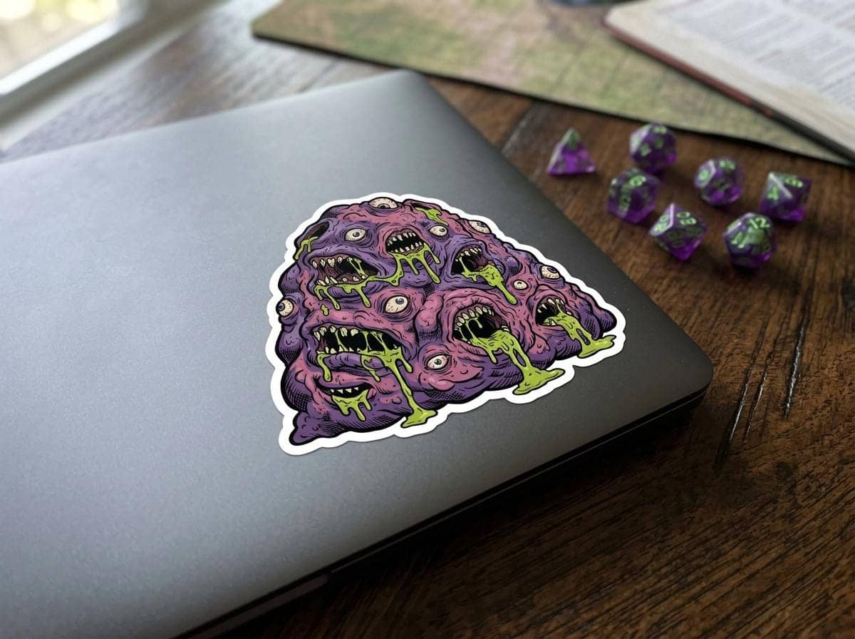 A grotesque aberrant monster sticker engineered for Dungeon Masters and eldritch horror enthusiasts personalizing laptops and hydro flasks, shown on a laptop lid