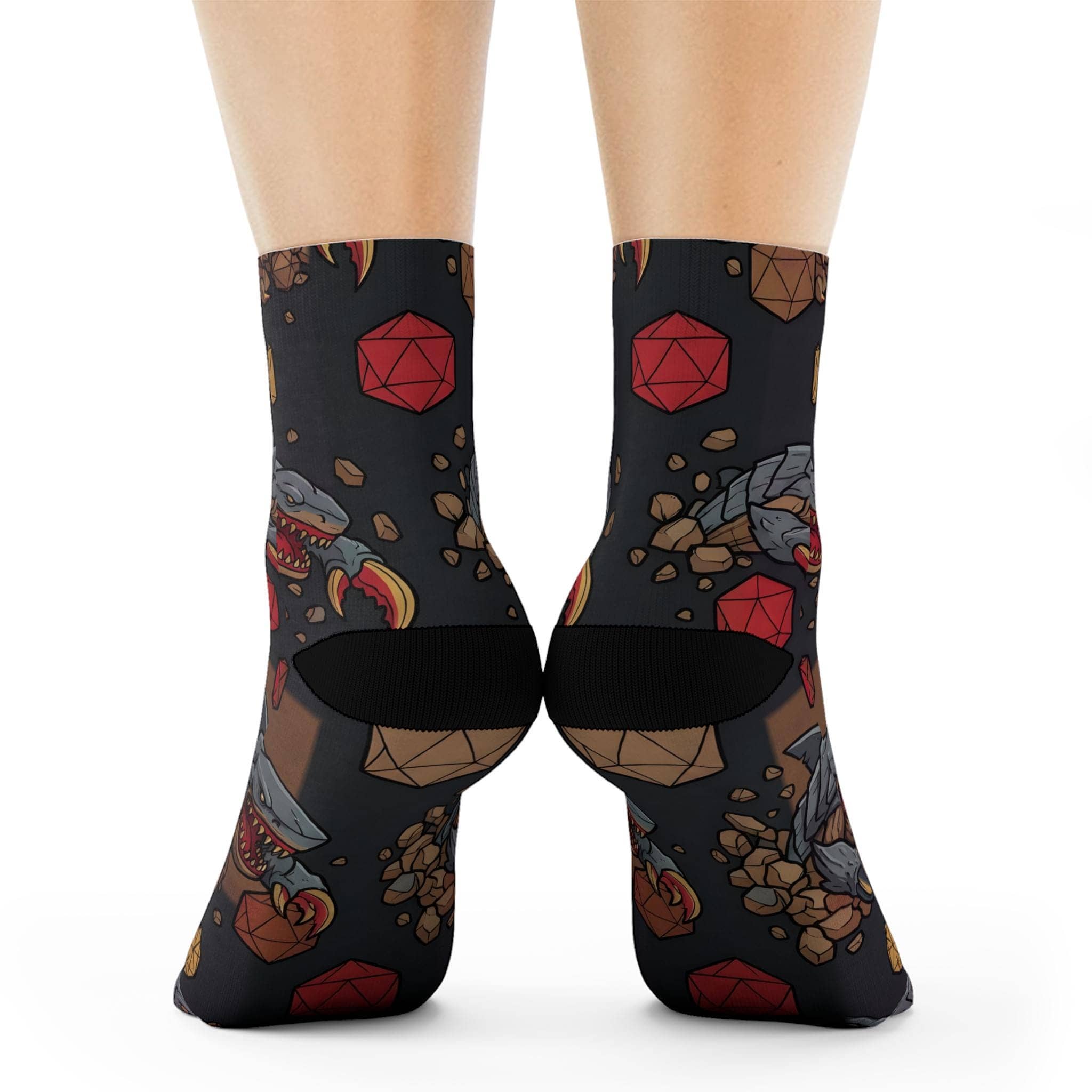 Humorous, combat-ready TTRPG crew socks featuring the notorious 'landshark' monster ambushing d20 dice in a seamless pattern, back view