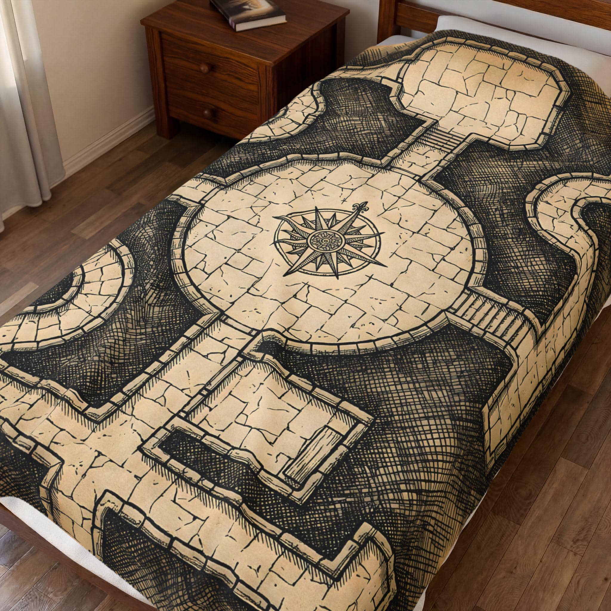 Ultra-soft fleece throw blanket printed edge-to-edge as a vintage hand-inked dungeon crawl floorplan with secret chambers and trap glyphs, in a room setting