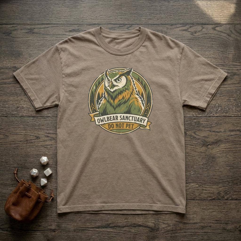 Vintage national park souvenir graphic tee featuring tabletop gaming's favorite deadly predator alongside a cheeky 'Do Not Pet' warning for players who insist on taming wilderness monsters, shown laid flat among dice