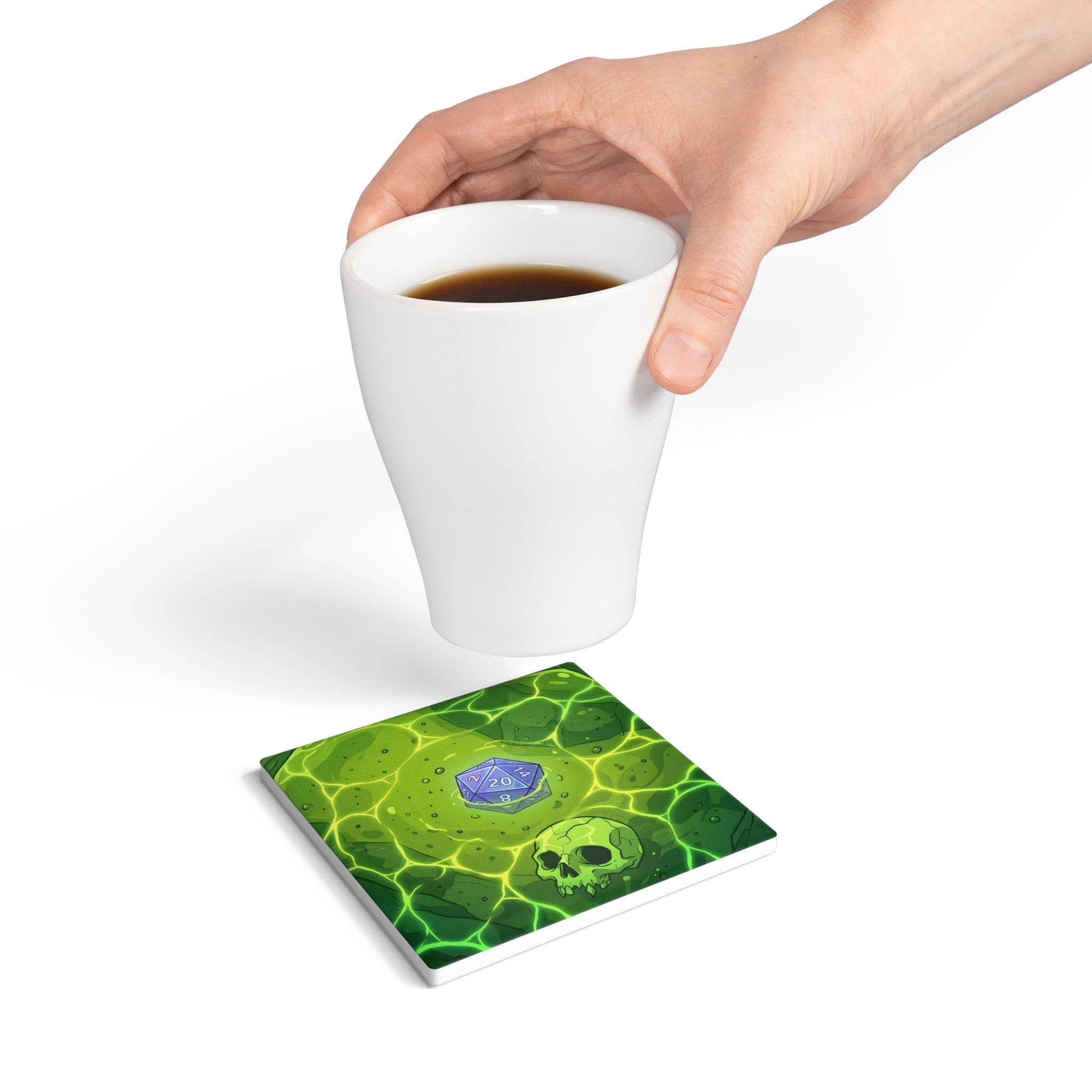 A square high-gloss drink coaster designed to look like a direct top-down view into a translucent acidic gelatinous cube trapping sunken dice and adventurer bones, serving as a witty spill hazard for campaign nights, in a room setting