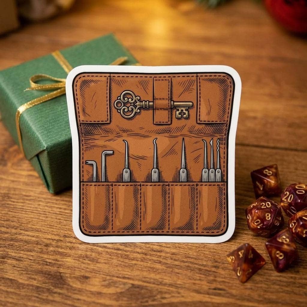 A detailed kiss-cut vinyl decal featuring an unrolled rogue's leather lockpick kit, shown as a gift
